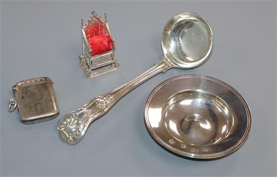 A silver miniature coronation chair, a silver vesta case, a small dish and a silver sauce ladle